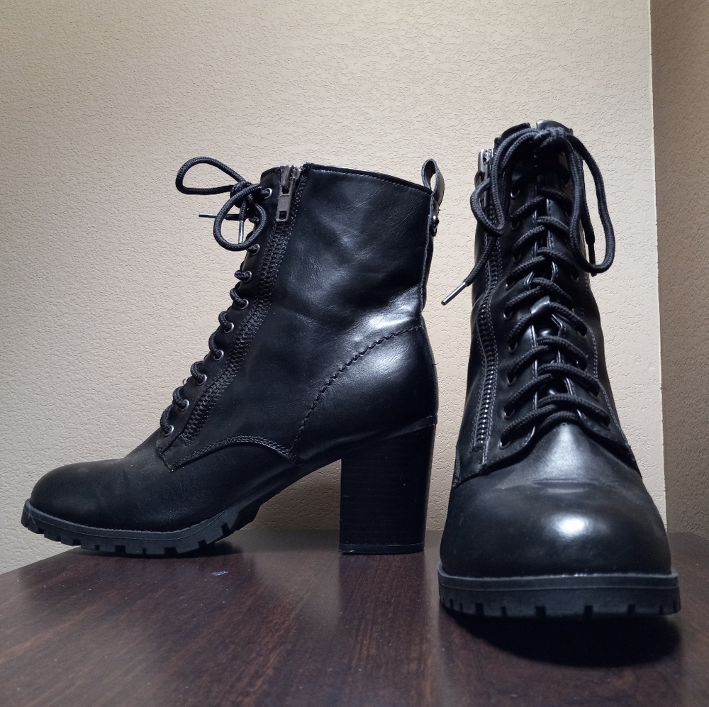 Black lace-up heeled boots
